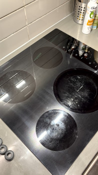 Polishing glass-ceramic plates